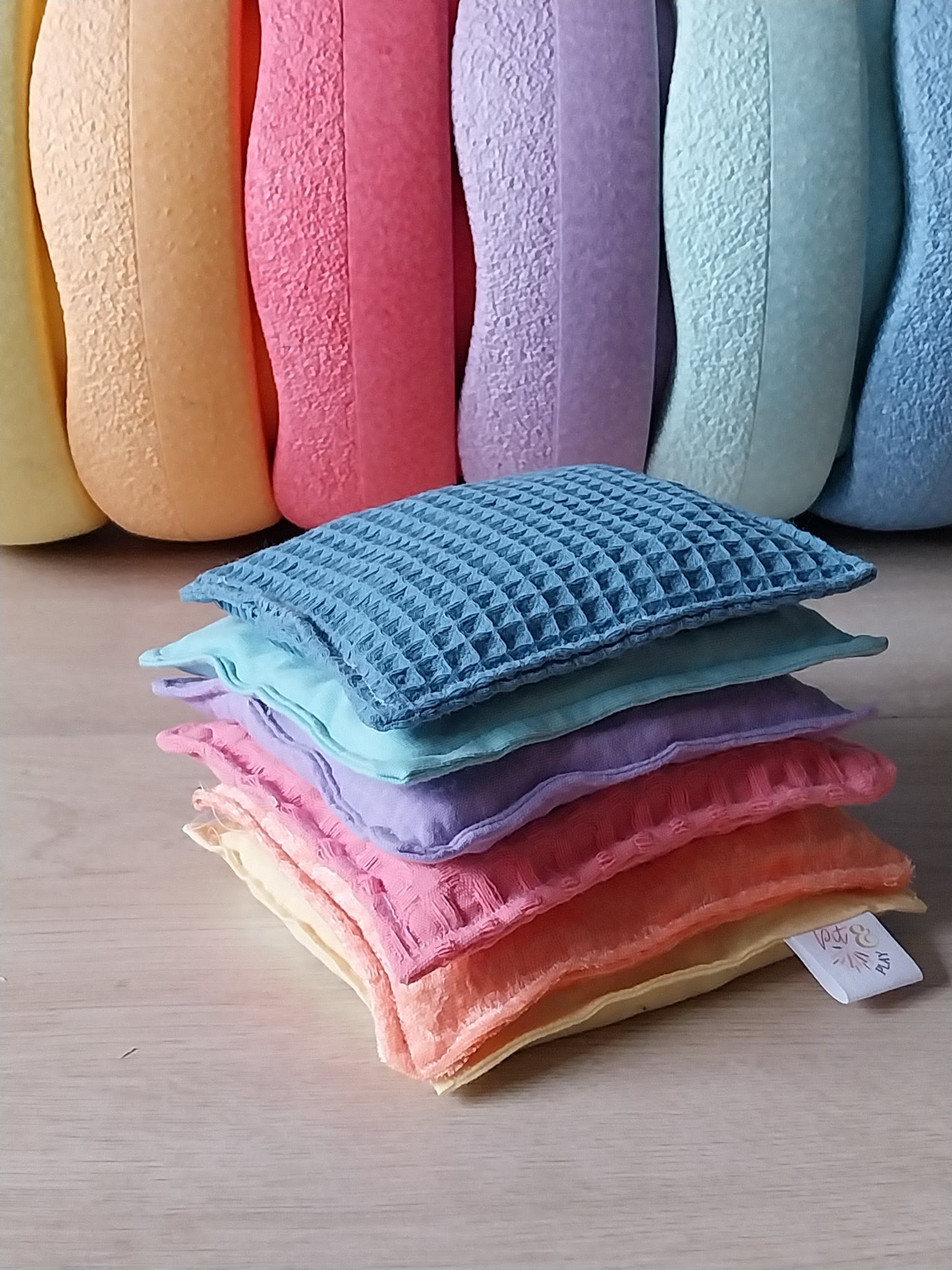 Pastel sensorische pittenzakjes - Stapelstein speelgoed