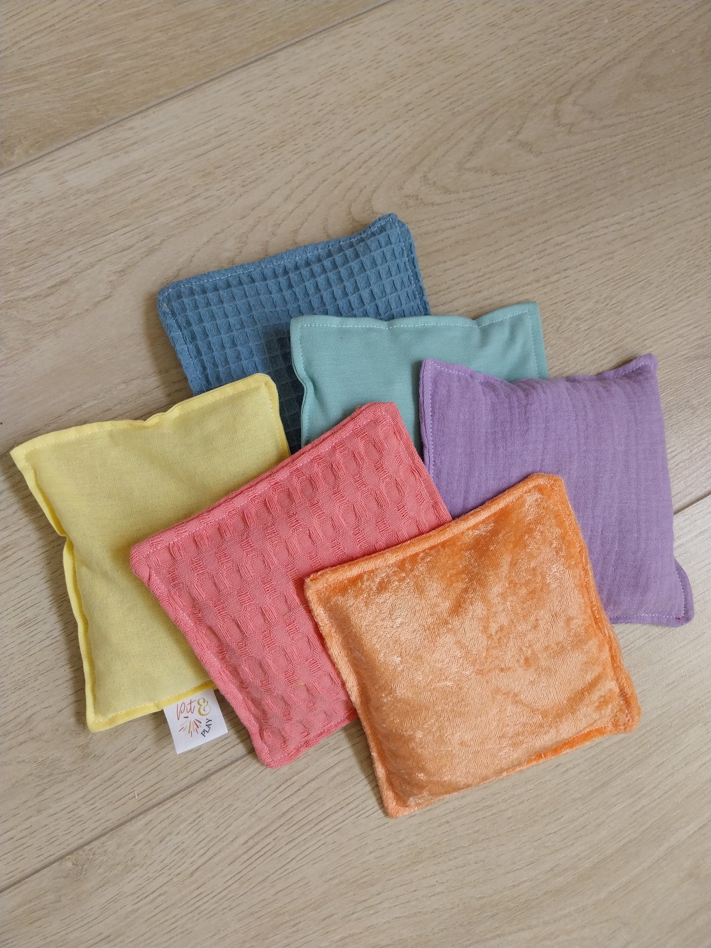 Pastel sensorische pittenzakjes - Stapelstein speelgoed