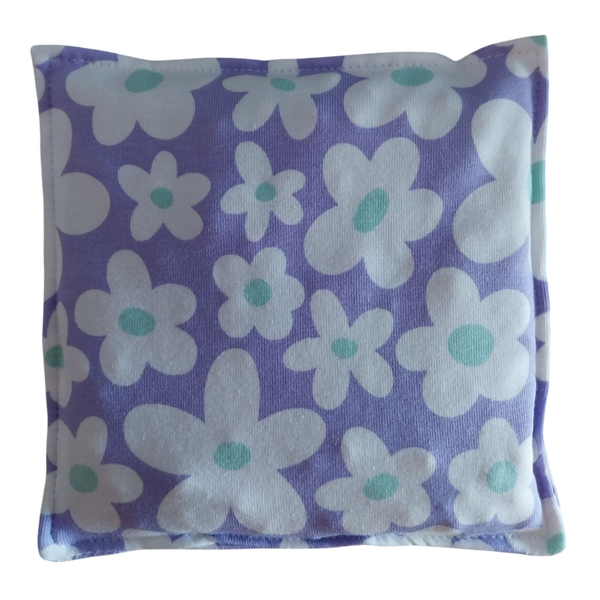Lila bloemen pittenzakje