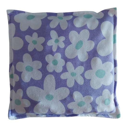 Lila bloemen pittenzakje